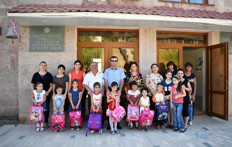 Children attending first grade in a number of communities received stationery as a part of charity programs