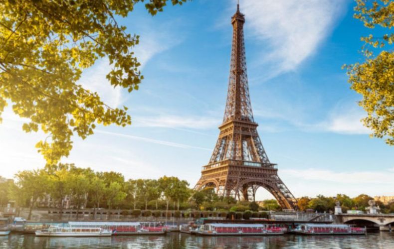 Eiffel Tower reopens after three-month coronavirus break